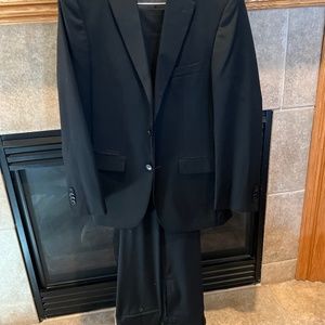 Great buy for holiday events!! 2 avail. Awearness Kenneth Cole black wool suit